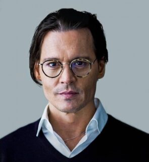 Johnny Depps dress shirt and blue sweater with bullet hole